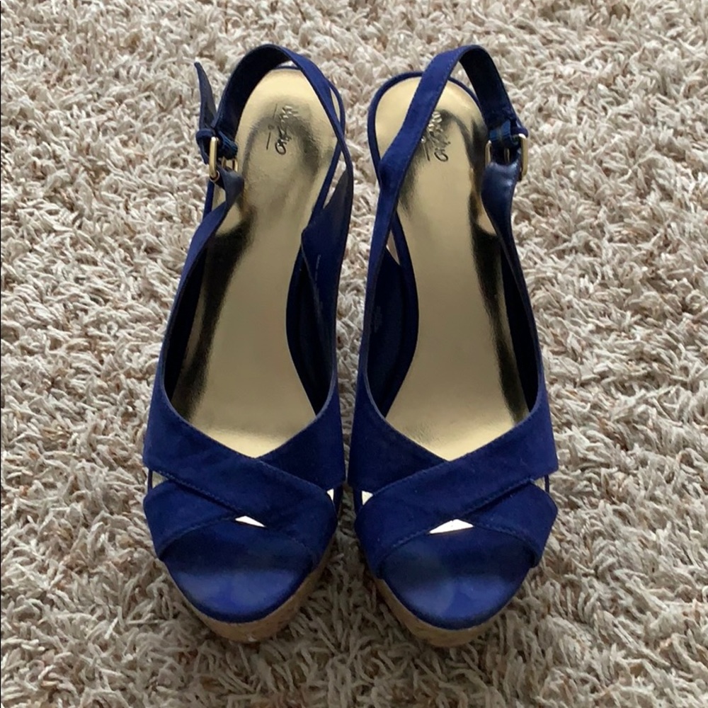 Wedge heels. Worn once. Royal blue color.
